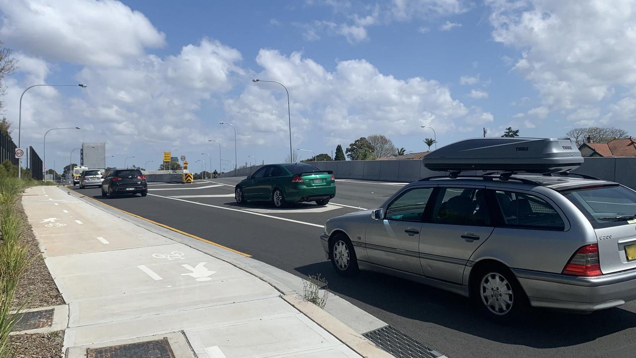 The green car above changes its mind on what lane to take and cuts in front of other cars: Picture: Benedict Brook