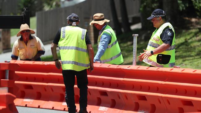 The border restrictions have been stepped up. Police setting up barriers in Miles Street, Coolangatta. Picture: NIGEL HALLETT