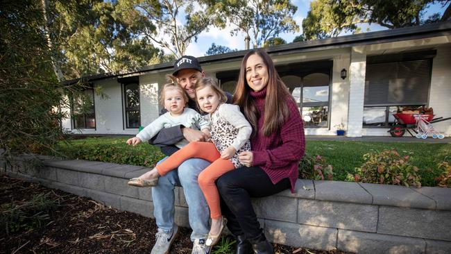 ADELAIDE, AUSTRALIA - ADVERTISER Photos - MAY 6, 2023: Budget case study - Mortgage holders, Dan and Cian Peters with children Lainie 5yrs and Mollie 1yr old outside their Coromandel Valley home. Picture: Emma Brasier