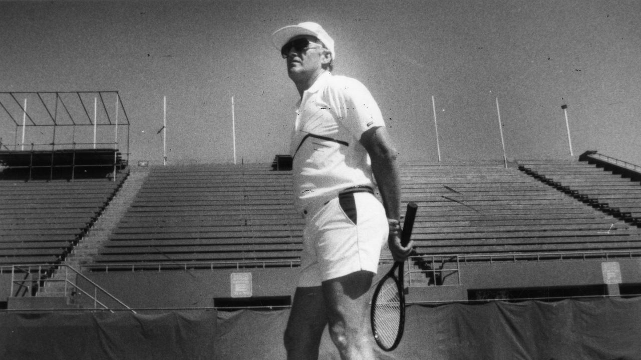 Neale Fraser watches his players practice in 1987 is his role as Australia’s Davis Cup captain. Picture: Stuart Hannagan