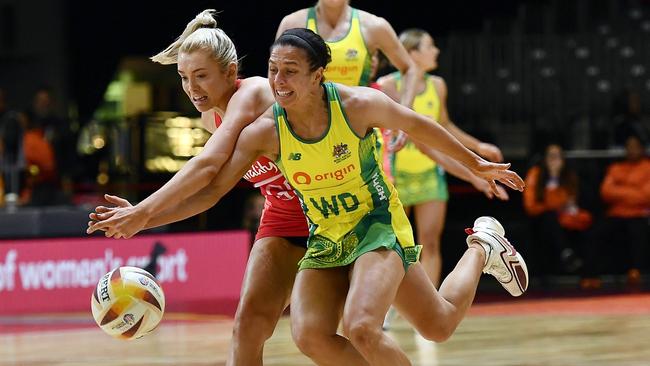 Helen Housby of England and Ash Brazill of Australia fight for the ball. Picture: Getty