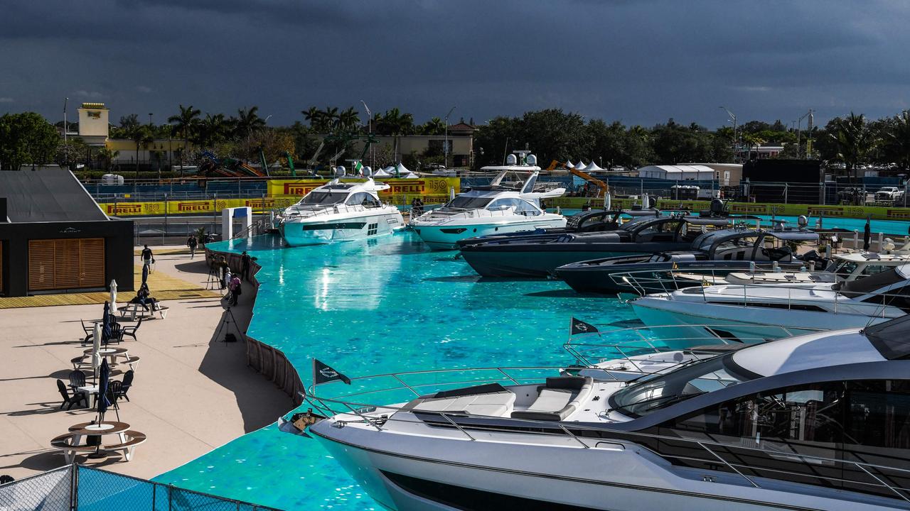 The fake water at the track in Miami could be real in a few decades. (Photo by CHANDAN KHANNA / AFP)