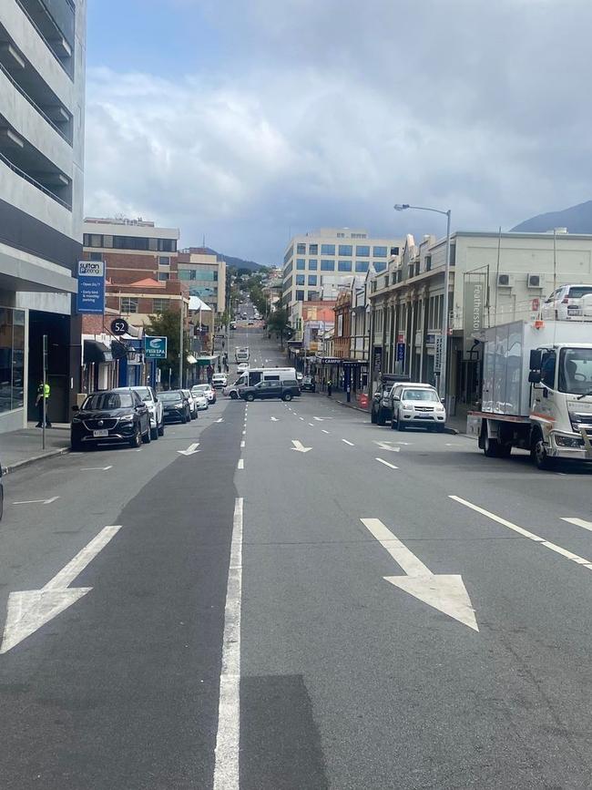 Police have closed and blocked off Bathurst St in Hobart's CBD as they respond to a "suspect article" incident inside Your Hobart Doctor. Photo: Judy Augustine