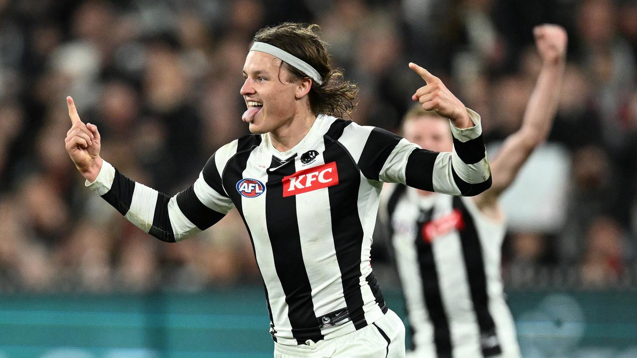 MELBOURNE, AUSTRALIA – AUGUST 25: Jack Ginnivan of the Magpies celebrates kicking a goal during the round 24 AFL match between Essendon Bombers and Collingwood Magpies at Melbourne Cricket Ground, on August 25, 2023, in Melbourne, Australia. (Photo by Quinn Rooney/Getty Images)