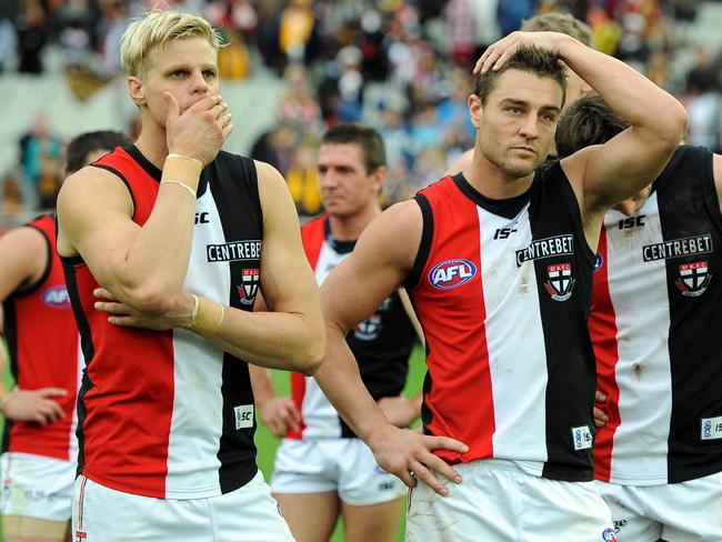 Fisher, pictured with Nick Riewoldt, after a St Kilda loss.