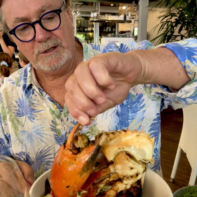 Des Houghton eating mud crab at Sails in Noosa