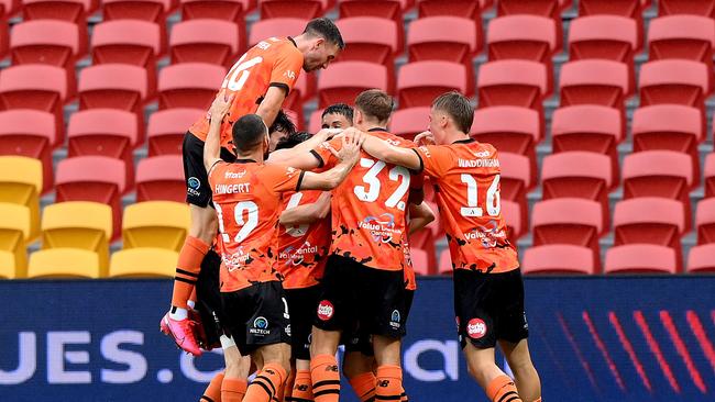 Roar players celebrate a goal from Kai Trewin in Brisbane’s 5-1 win over Melbourne City. Picture: Bradley Kanaris/Getty Images