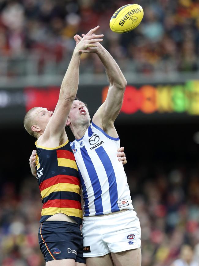 Todd Goldstein wins a hitout against Adelaide’s Sam Jacobs. Picture: Sarah Reed. 