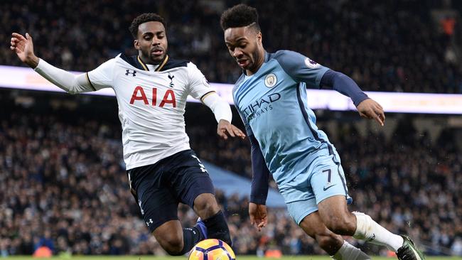 Tottenham Hotspur's English defender Danny Rose (L) vies with Raheem Sterling.