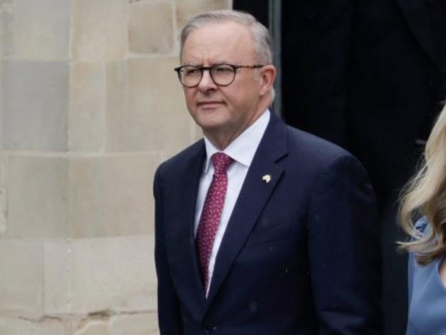 Prime Minister Anthony Albanese has worn a pair of South Sydney Rabbitohs socks to the coronation of King Charles. ,