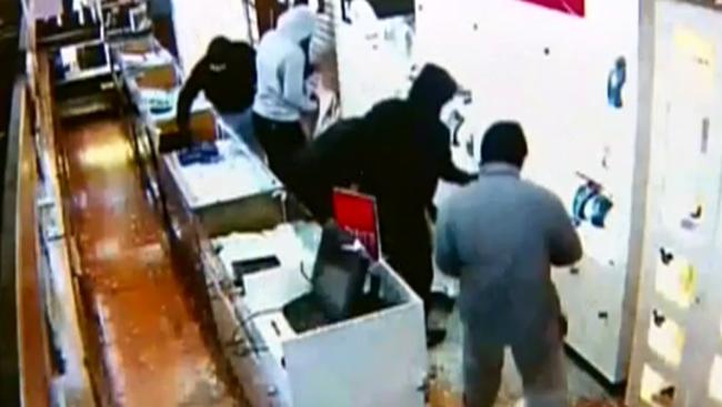 CCTV captures five masked thugs robbing an Elsternwick jewellery store. Picture: Channel 9.