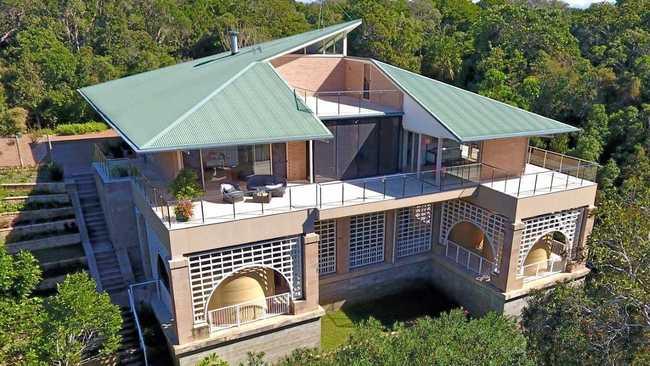 VALUE BUY: The house at 830 Fingerfield Rd sits on 77ha of sub-tropical rainforest.