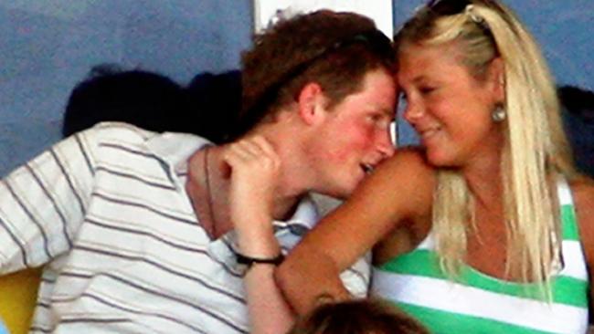 Britain's Prince Harry (L) enjoys a moment with his girlfriend Chelsy Davy as they watch the ICC World Cup Cricket 2007 Super Eight match between Australia and England at the Sir Vivian Richards Stadium in St John's, 08 April 2007. England scored 190-5 at 37 overs play as they elected to bat first after winning the toss. AFP (Photo : Jewel SAMAD)