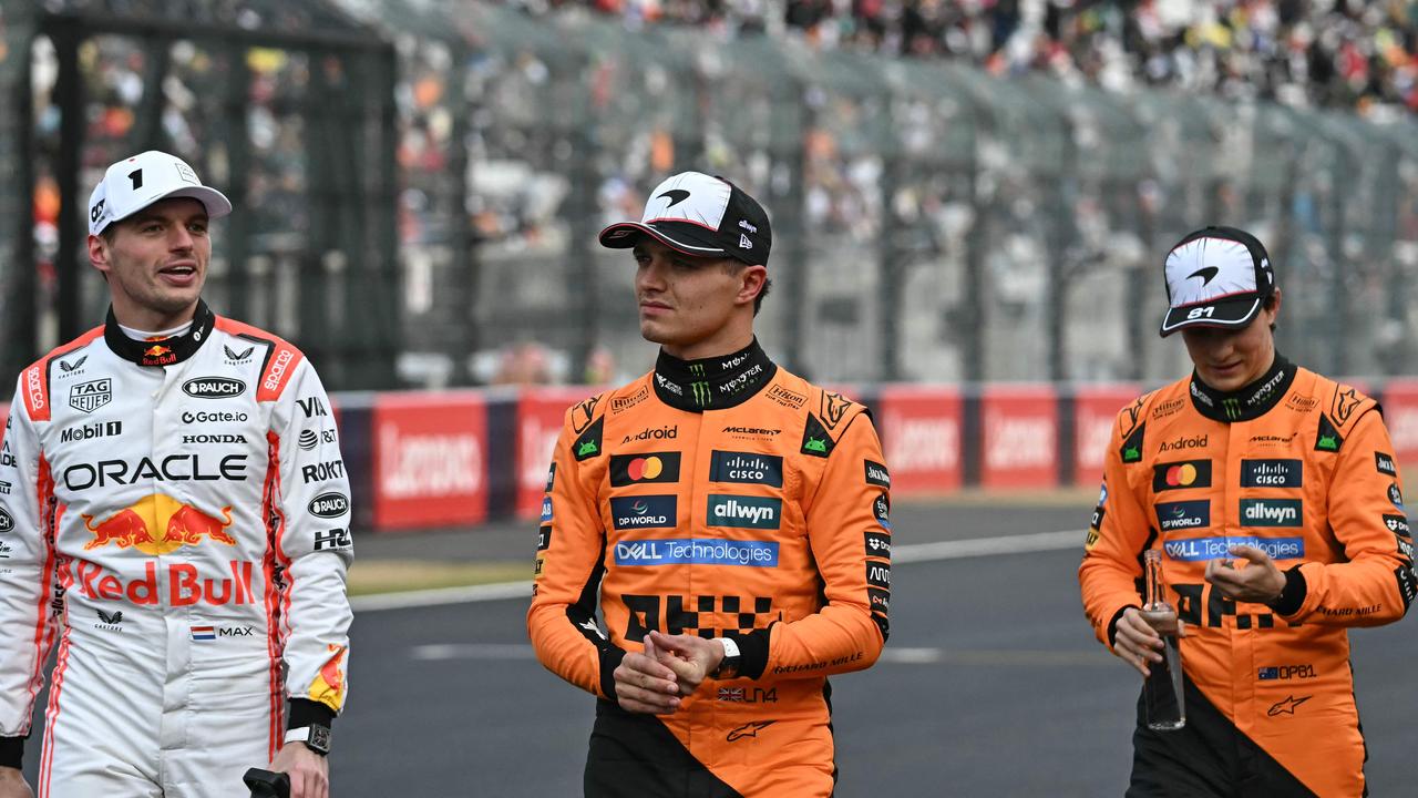 Max was powerless to slow the McLaren duo down. (Photo by MOHD RASFAN / AFP)