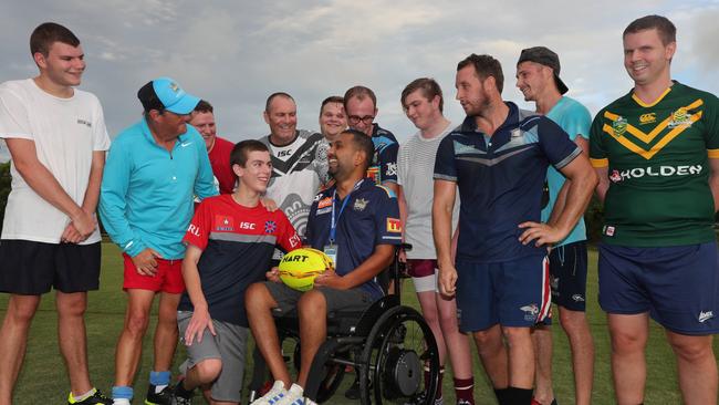 Gold Coast Titans physical disability rugby league team players with Dr Dinesh Palipana. Picture: Glenn Hampson