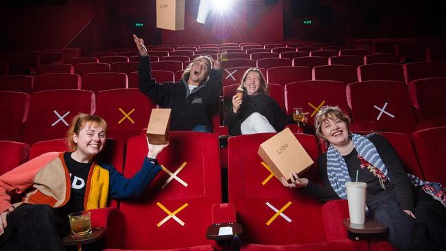 Cinema diehards Juliette Salom, 21, Benji Tamar, 28, Erin Rosenberg, 27, and Maija Drezins, 19, prepare for the reopening of Lido Cinemas. Picture: Jason Edwards