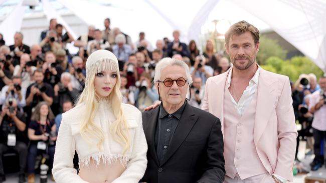 Anya Taylor-Joy, George Miller and Chris Hemsworth attend the "Furiosa: A Mad Max Saga" photocell at the 77th annual Cannes Film Festival at Palais des Festivals on May 16, 2024 in Cannes, France. Photo: Neilson Barnard/Getty Images.