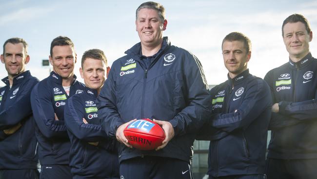 Carlton Women's Coach Damien Keeping (centre) flanked by Assistant Coach Shane Watson, Assistant Coach Dale Amos, Men's Coach Brendon Bolton, Assistant Coach Tim Clarke and Assistant Coach John Barker at Carlton's Ikon Park home ground. Picture: Eugene Hyland