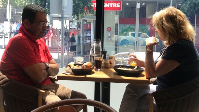 An exhibit photo from the IBAC hearing, in which Casey councillor Sam Aziz and political lobbyist Lorraine Wreford met at a cafe in 2019.