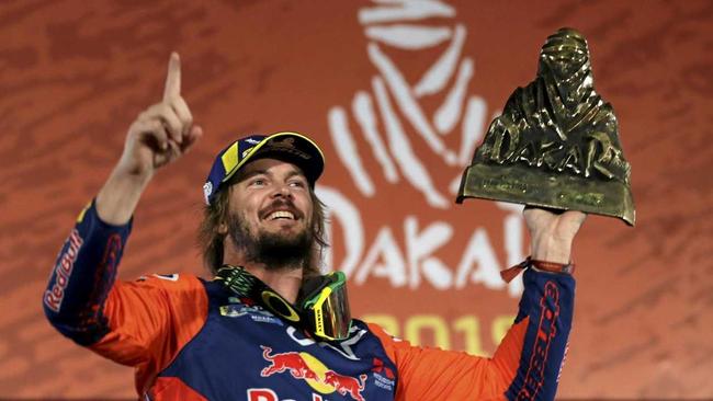 MAKE THAT TWO: Toby Price won his second Dakar Rally winner's trophy in Lima, Peru on Thursday, January 17. Picture: Martin Mejia