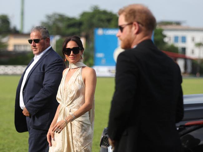 Meghan Markle in a revealing dress at the Ikoyi Polo Club in Lagos. Picture: AFP