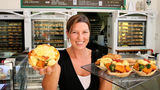 Deborah Smith with a selection of gourmet meat pies at Upper Crust Pies, Collaroy.