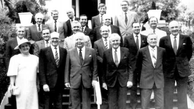 Sir Joh with members of his cabinet in 1986 including ministers Brian Austin (second left, front), and Don Lane (far right, front) who were jailed as a result of the Fitzgerald inquiry. (Bob Katter is in back row, third from left).