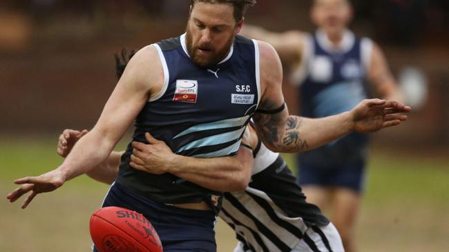 July 27, 2019 EFL (Division 4): Silvan v Surrey Hills 17 Trent Martin for Silvan is tackled. Picture: Stuart Milligan