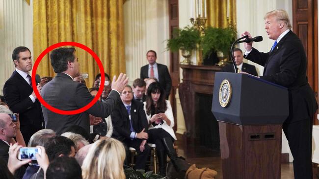 US President Donald Trump criticises CNN journalist Jim Acosta (circled) during the post-election press conference in the East Room of the White House last week.