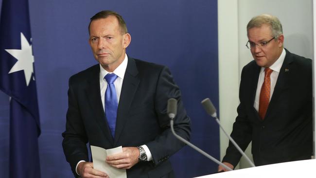 Tony Abbott, left, was reportedly involved in a heated exchange with Scott Morrison over proposed changes to superannuation.