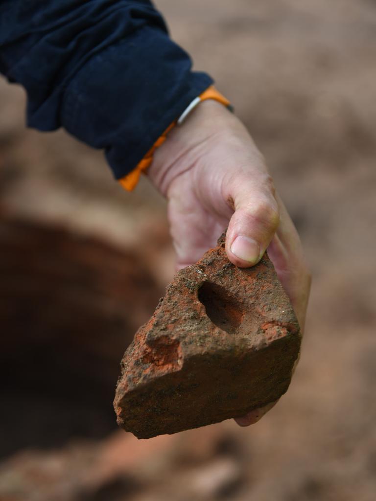 An original brick with the maker’s thumb print. Picture: Naomi Jellicoe