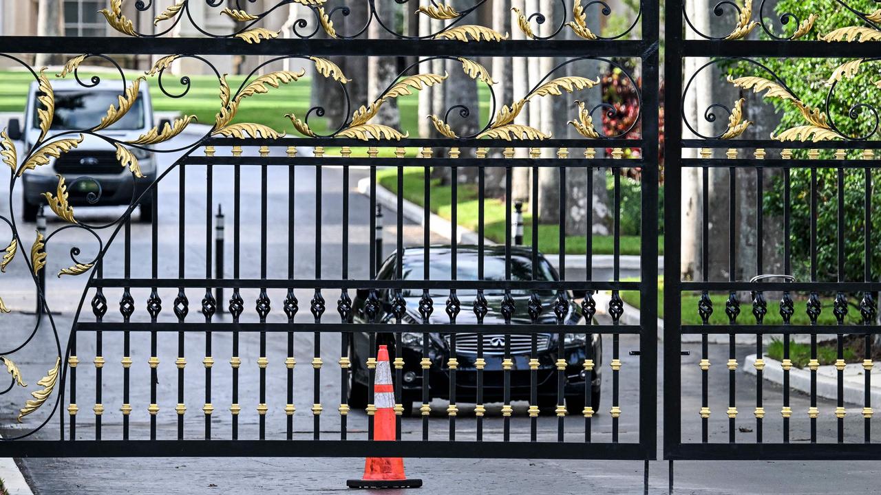 A police car blocks the main gate of the Trump International Golf Club in West Palm Beach, Florida, following the alleged assassination attempt on Donald Trump on September 15 local time. Picture: Chandan Khanna/AFP