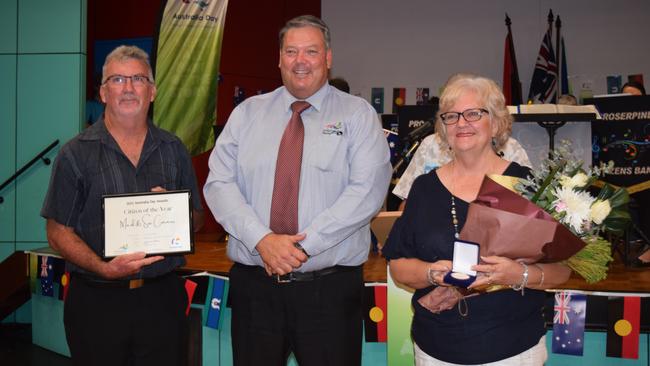 Whitsunday Mayor Andrew Willcox (centre) with 2021 Citizens of the Year for Airlie Beach, Cannonvale, Proserpine and surrounds Mark and Sue Connors. Photo: Elyse Wurm