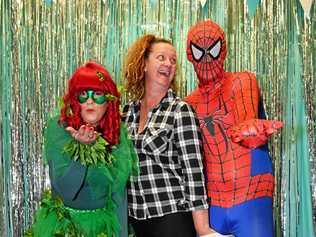 POWERS ON POINT: Superheroes Samantha Hope, Janelle Wright and Dave Figg warm up for the carnival fundraiser at Kings Beach Tavern. Picture: John McCutcheon