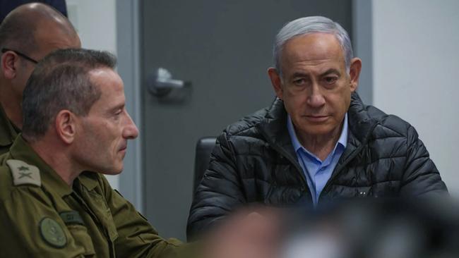 Prime Minister Benjamin Netanyahu attends a meeting in the command center of the defence ministry in Tel Aviv.