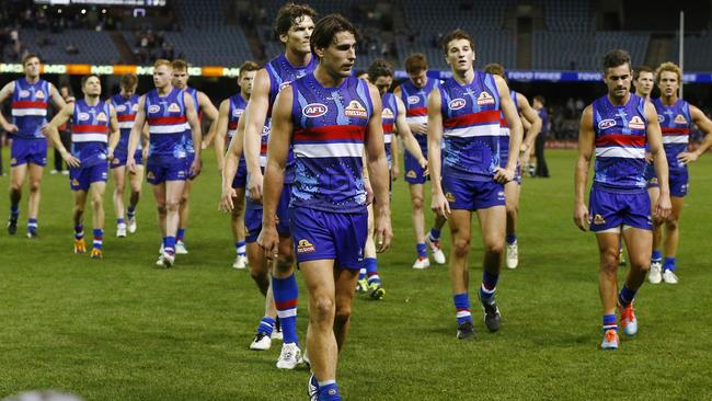 AFL Round 11: Western Bulldogs v Fremantle at Etihad Stadium. Ryan Griffen leads the Bulldogs off Etihad Stadium after losing to the Dockers. Pic: Michael Klein. Saturday May 31, 2014.