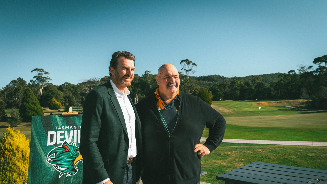 Brendon Gale CEO Tasmania Football Club with David Foster champion axeman. Launch of 'together, we are the team' poster and coaster campaign, a joint initiative by the Tasmania Football Club and the Tasmanian Hospitality Association. Picture: Tasmania Football Club