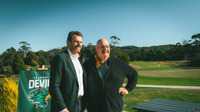 Brendon Gale CEO Tasmania Football Club with David Foster champion axeman. Launch of 'together, we are the team' poster and coaster campaign, a joint initiative by the Tasmania Football Club and the Tasmanian Hospitality Association. Picture: Tasmania Football Club