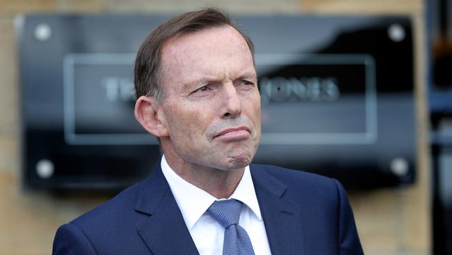 Former Prime Minister Tony Abbott speaks to media outside the Henry Jones Hotel on Hobart's waterfront this morning. Picture: Luke Bowden