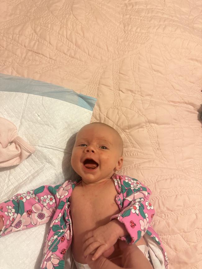Tully Rose Grace, five weeks old. My gorgeous five week old, blue eyed, blonde hair, miracle baby with her first smiles.