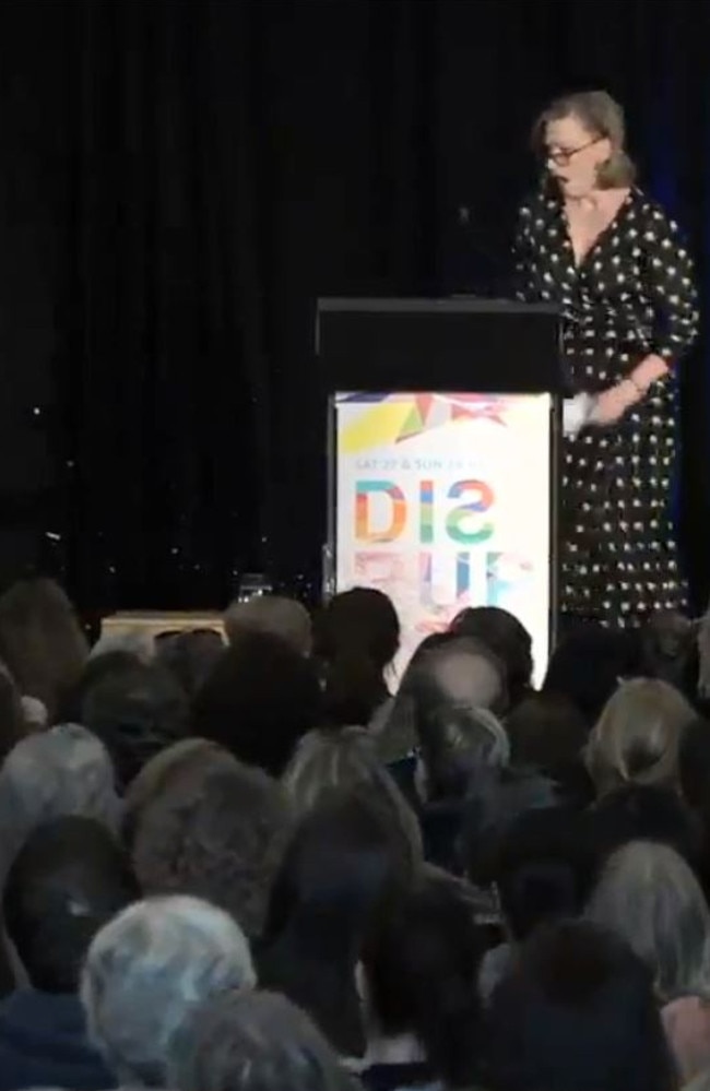 Screengrabs from a video on the State Library of Western Australia's Facebook page where a yoghurt container is thrown at Leigh Sales during a talk during the Disrupted Festival 2019 at the State Library of Western Australia. Picture: Facebook / State Library of Western Australia