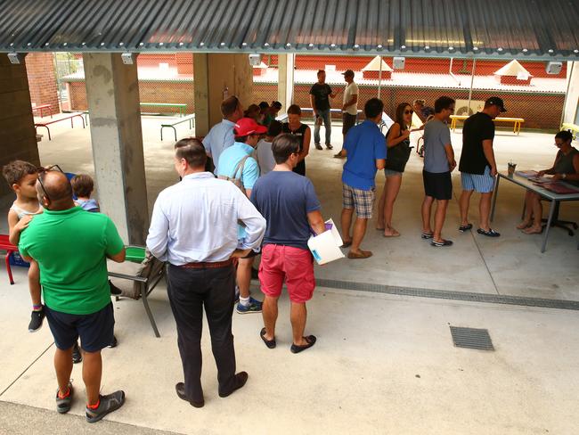 Parents lining up to secure an enrolment spot at Ascot State School.