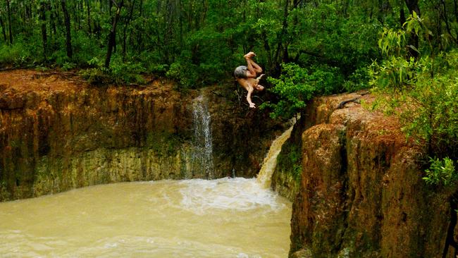 Nhulunbuy’s Nathan Turner enjoys a flooded quarry. Picture: Elise Derwin