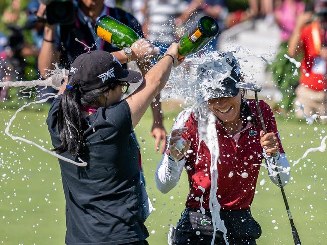 A champagne celebration for golfer Celine Boutier after winning the Evian Championship, in the French Alps. Picture: Fabrice Coffrini/AFP