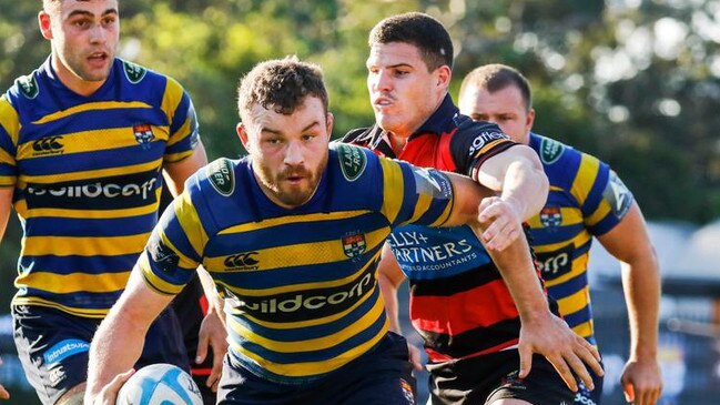 Shute Shield action between Norths and Sydney Uni.