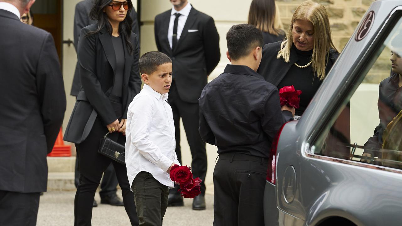 Chehade’s grandsons farewelling their ‘jidou’ at the hearse. Picture: Matt Loxton