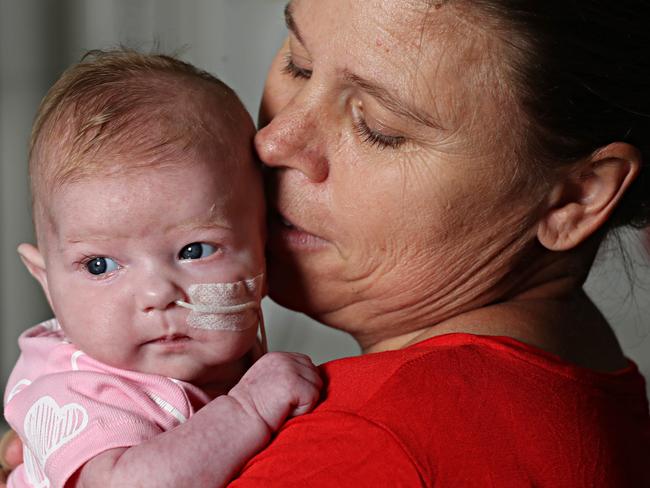 Poppy-Rose Tunnah, with mum Susan Henrich. Picture: Annette Dew