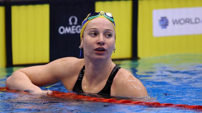 Mollie O'Callaghan checks the times after swimming her heat of the Women's 100m Freestyle. Picture: Getty Images