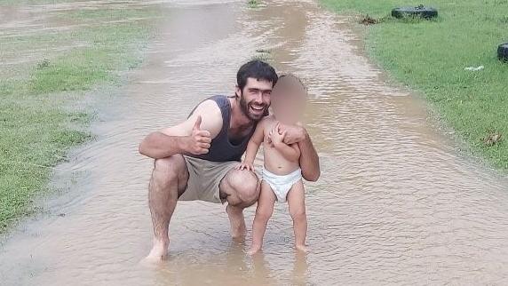 Hue Mills (L) with his young child. A young man has died after events at a New Year’s Eve rodeo event in the Queensland went terribly wrong. Picture: Facebook