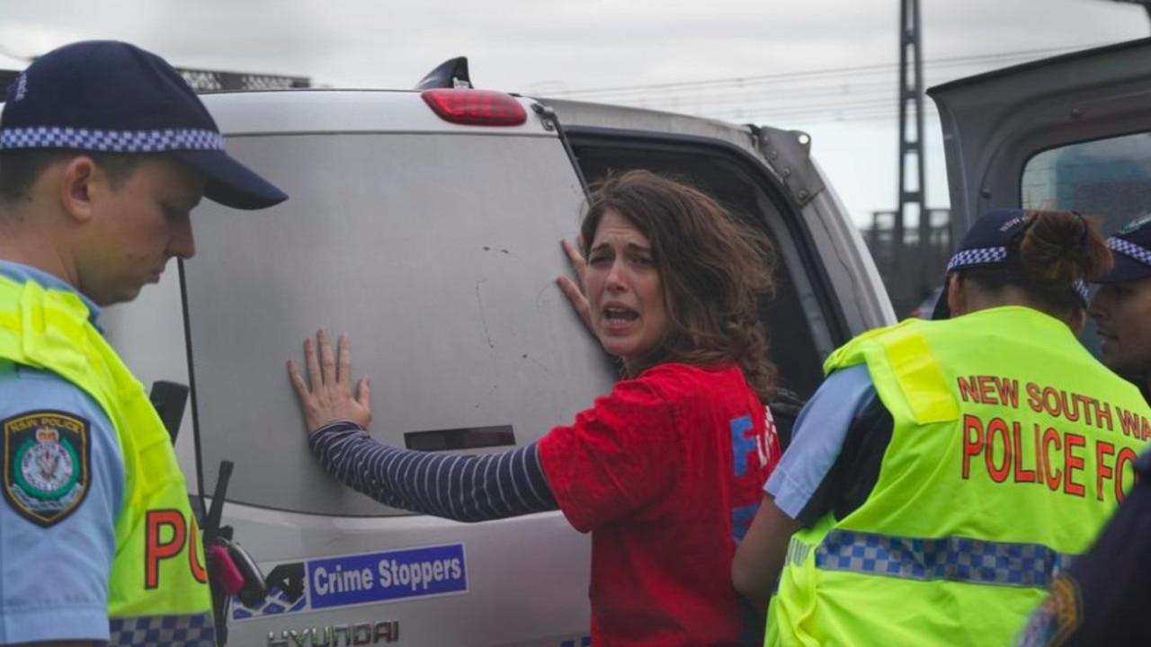 Deanna "Violet" Coco arrested during the protest.